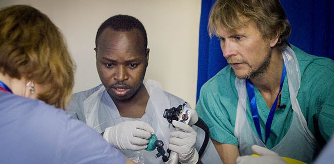 Dr. Steve Benson teaching colleagues in Rwanda.