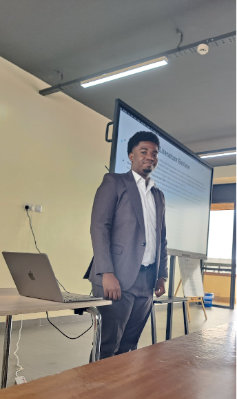 Patrick Bongo '27 lecturing during the workshop
