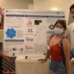Brian, Amanda, and Chenhui present a lab poster at the MCB retreat.