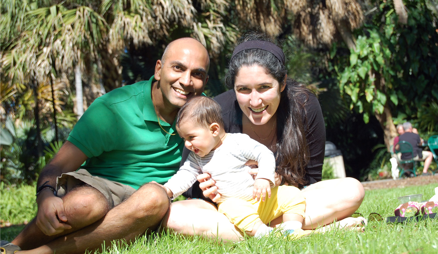 Samir Soneji with his wife, Valerie Lewis, who is also an assistant professor at TDI, and their 9-month old daughter.