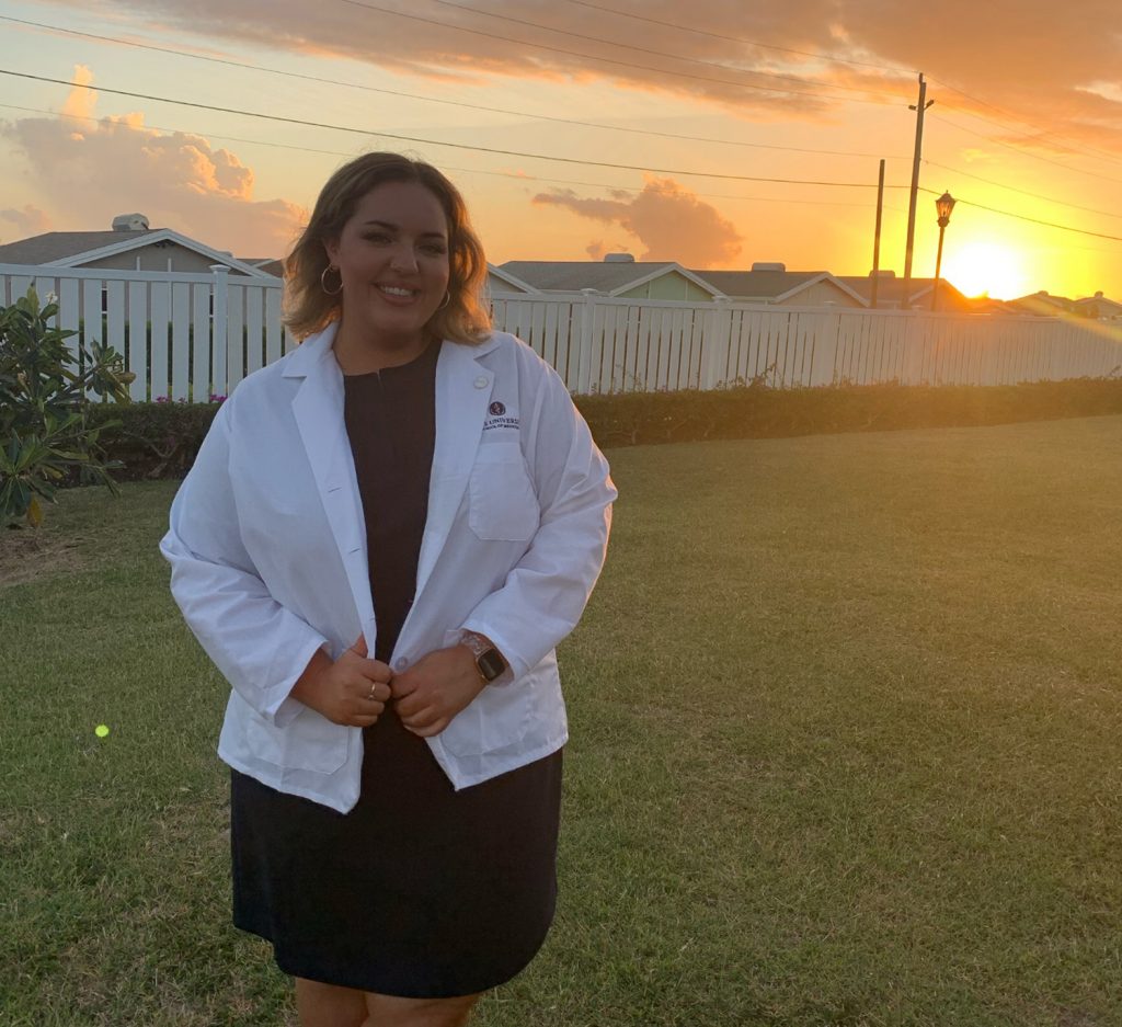 ashley collins outside with sunset