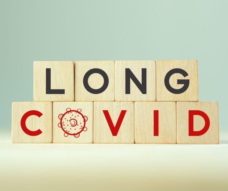 Words "Long COVID" spelled out in single letter tiles
