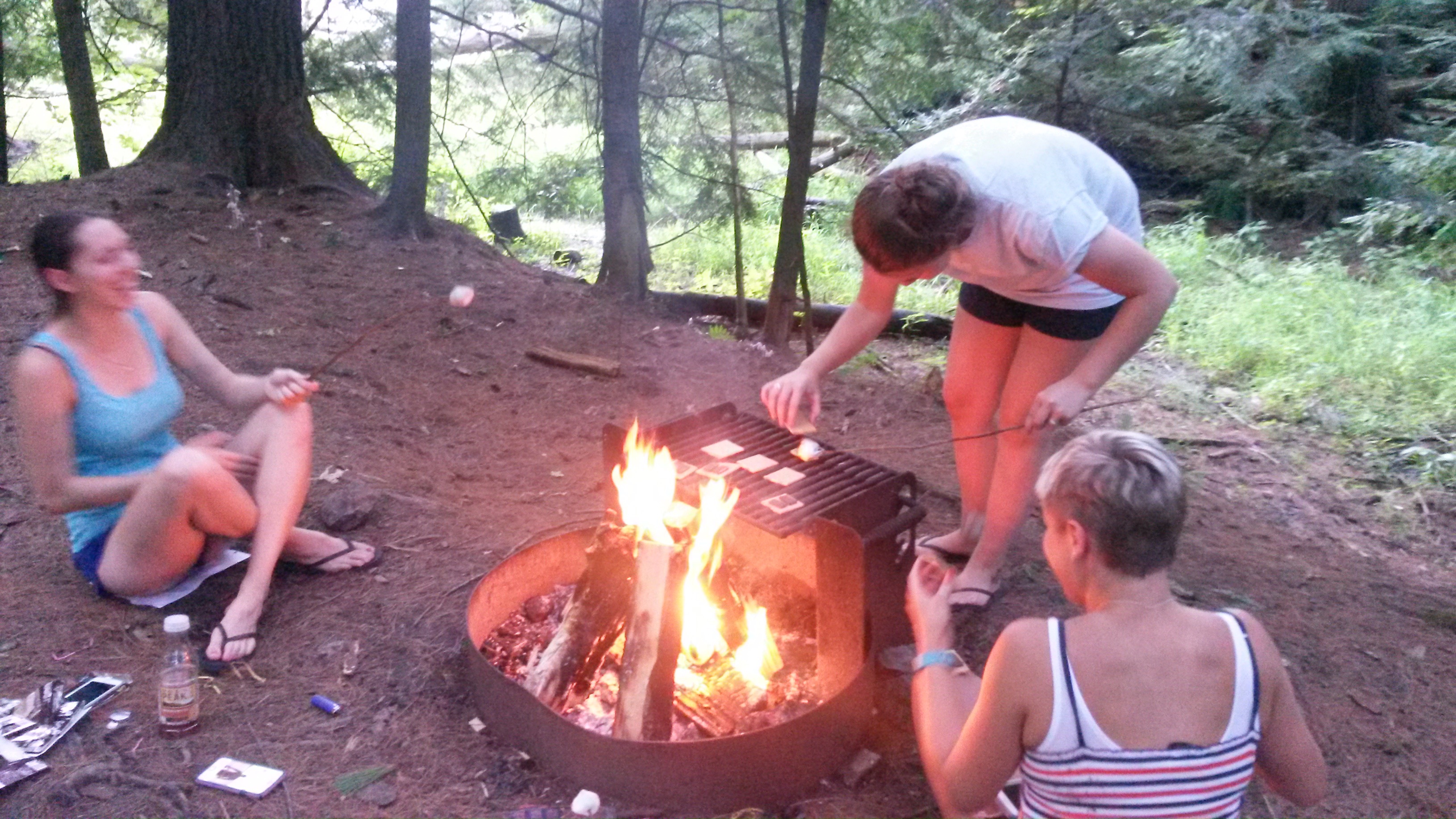 Rigby lab roasting S'mores at Storrs Pond, August 10, 2018